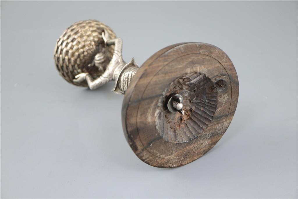 A 19th century Burmese engraved silver figural table salt,